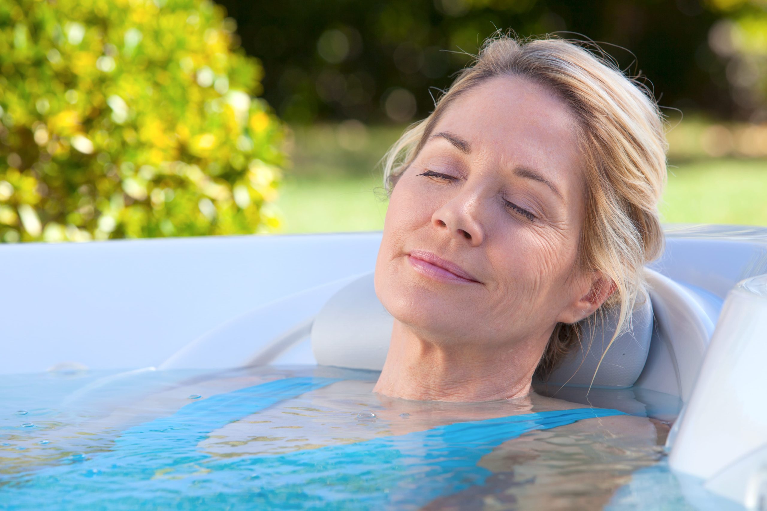 Soaking in a hot tub can help ease fibromyalgia symptoms.