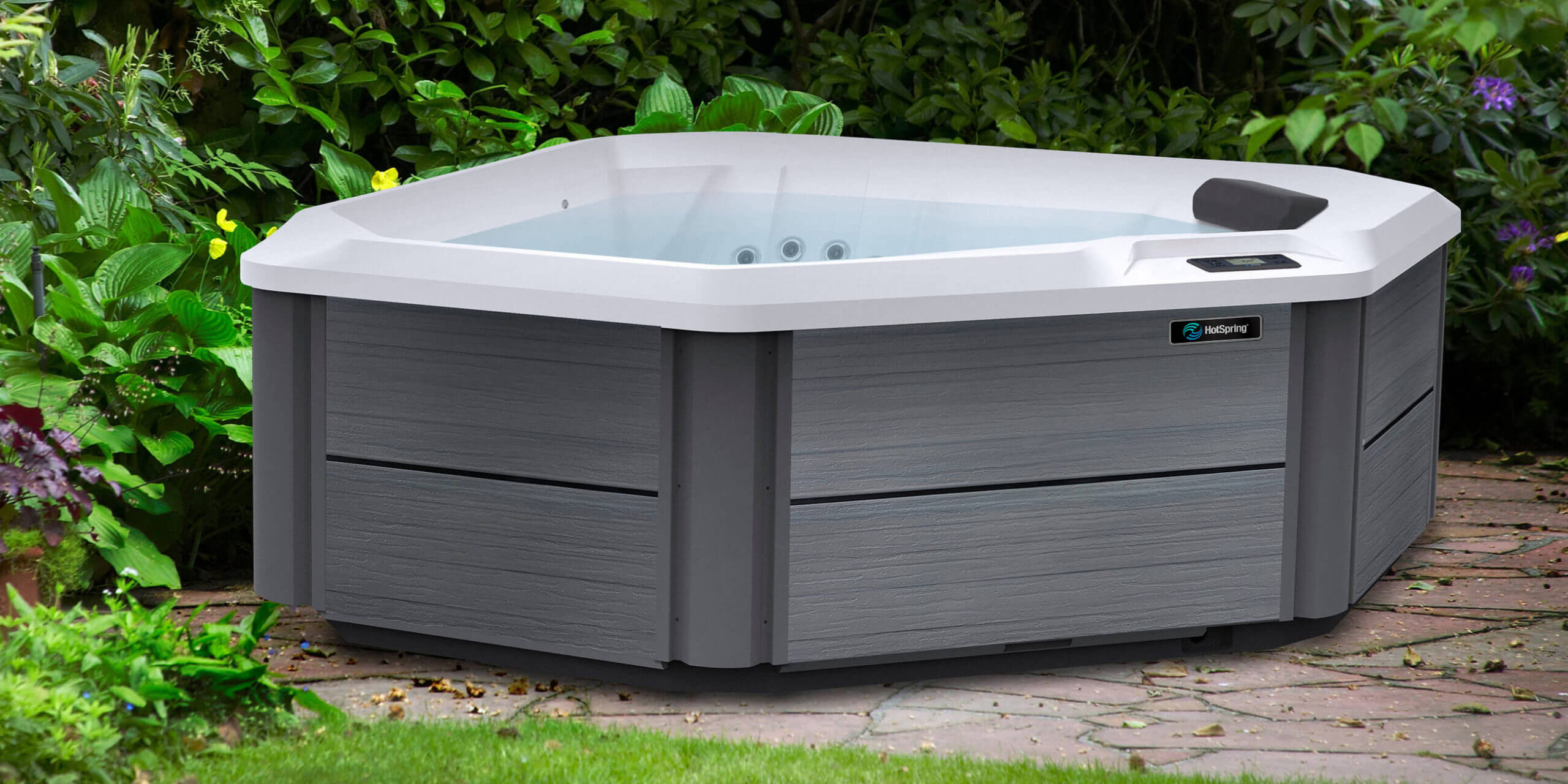 https://www.hotspring.com/wp-content/uploads/2022/03/hot-spring-spas-hot-spot-collection-page-cspot-lifestyle-spa-empty-closeup-scaled-1.jpg